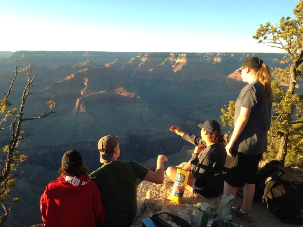 Abbie, Jacob, and Friends in the Grand Canyon at sunset