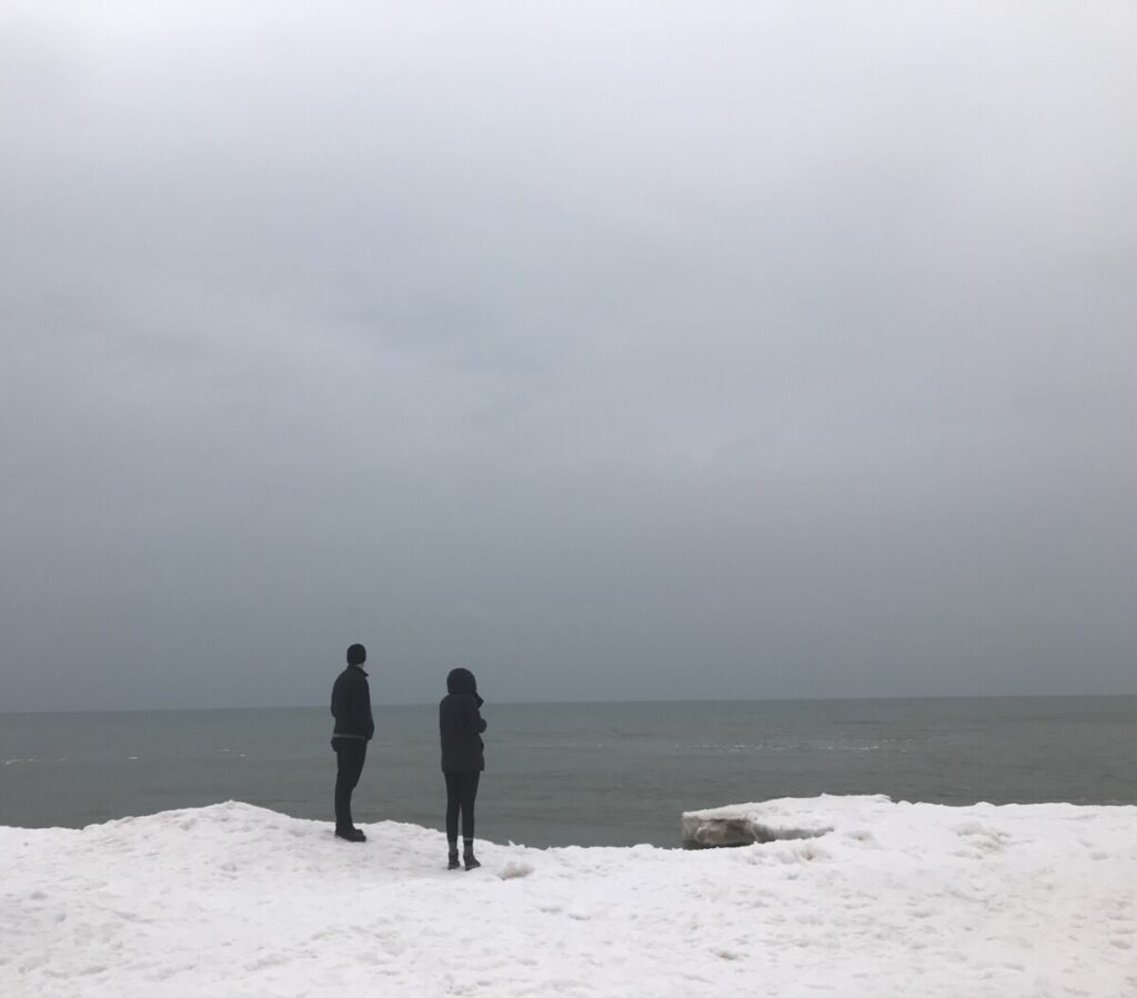 Abbie and Jake on a hazy day looking at Lake Michigan